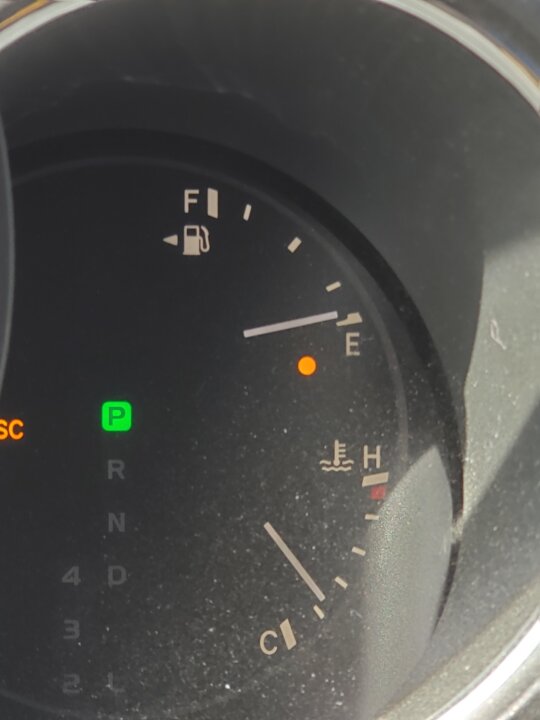 How far down do you let your gas gauge go... Before filling up? I let